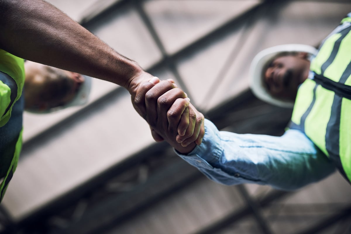 Construction professionals collaborating on commercial project